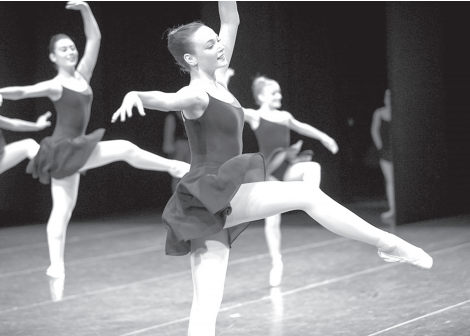 Pacific Northwest Ballet School student Mia Watson (12) with other PNB School students in the 37th Annual PNB School Performance. (Photo © Lindsay Thomas.)