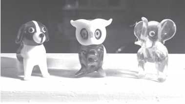 Above are a glass dog, an owl and an elephant. Elle Murray (12) was gifted these glass figurines as a kid and continues to look after them. (Courtesy of Elle Murray)