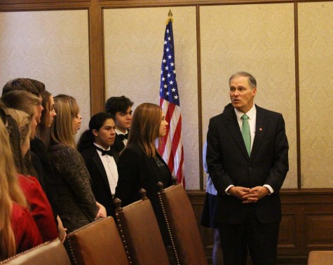 Henry BurresonGovernor Jay Inslee thanks Concert Choir and their director Courtney Pelavin for their performance of the national anthem.