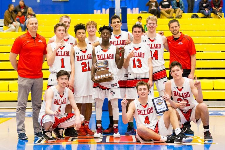 Christian J. StewartThe boys basketball team celebrates their championship victory at the UVic Alumni Invitational tournament in Victoria, BC.