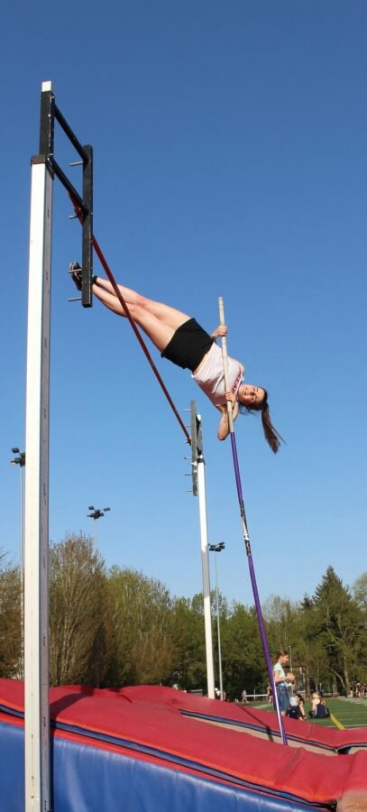 Julian WhitworthCelyn Stermer’s vaulting process at the recent track meet at Nathan Hale. Stermer broke her previous school record of 11 feet, 9 inches, and improved to 12 feet.
