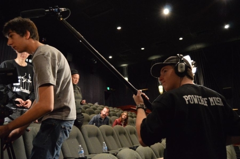 Courtesy of Victoria O’LaughlinJunior Jonny Cechony holds a boom to record clean audio during a shot. Throughout the day, the team’s sound technicians (Cechony and junior Percy Boyle) must switch off to prevent getting tired.
