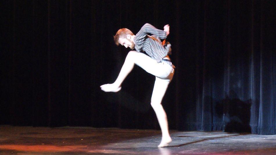 Senior and Mr. Bucky winner, Sean Adair displays his interpretive dance abilities to the audience for the talent portion.