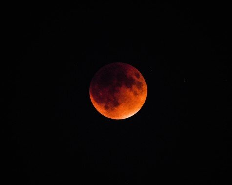 Aiden Sheckler A supermoon and total lunar eclipse took place Sunday, Sept. 27, giving the moon a dark red glow. This event will not occur for another 18 years.