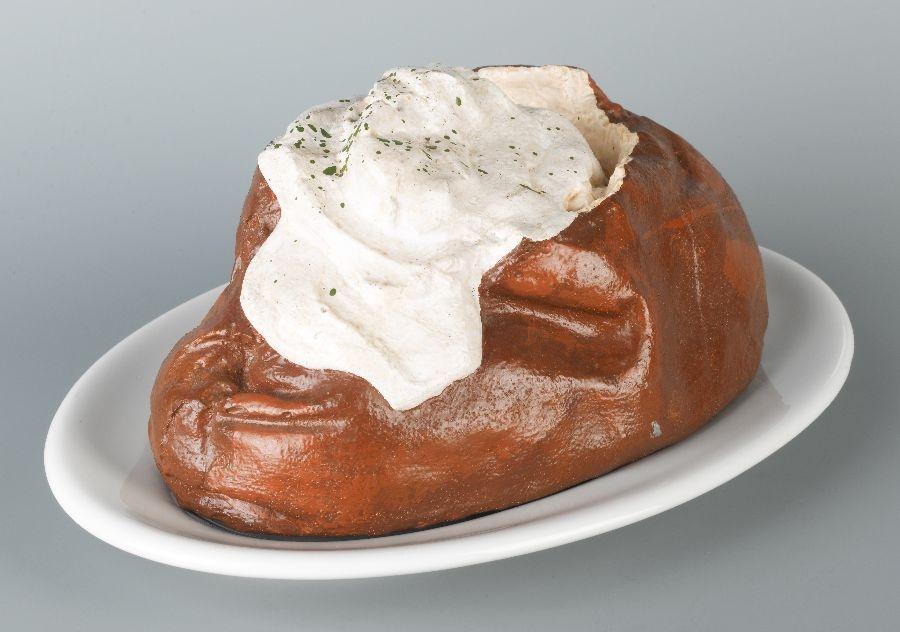Seattle Art Museum Baked Potato 1966 Claes Oldenburg, American, (born in Sweden), 1929 Cast resin, painted with acrylic, Shenango china dish