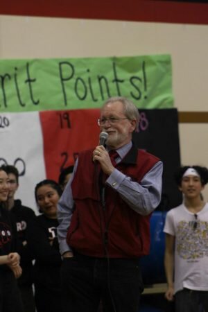 Julian WhitworthDr. Moody speaks at Academic Spirit Week assembly after being introduced by Inslee and Carlyle.