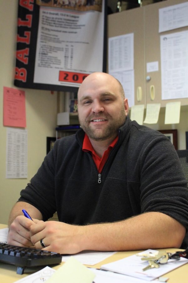 Miles Whitworth New Activity Director and Athletic Coordinator “Coach” Jason Thurston sits confidently at his desk, only a week after his first official day at Ballard. The walls and desks of his office are plastered with smiling faces and memories …