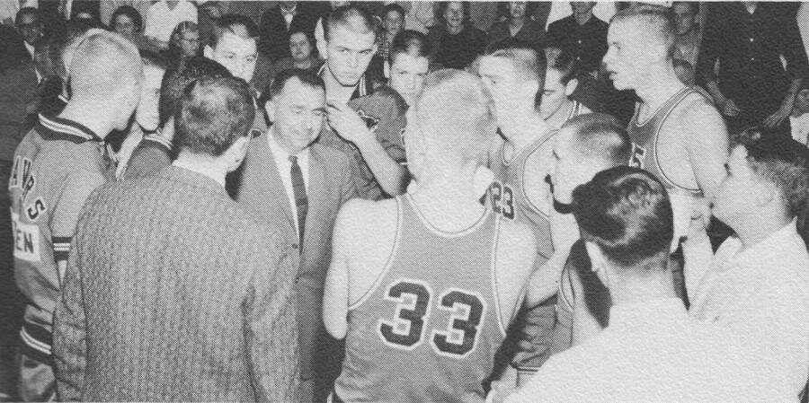 Shingle archivesNorman Goldstein talks with his team during a timeout in the 1962 season. He led the team to the state championship game that season.