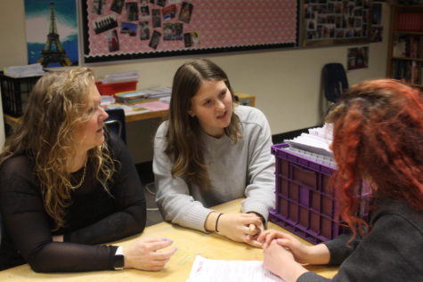 ASB advisor Laura Lehni, Addy Wynkoop and Cass Sylves discuss Winter
Ball.