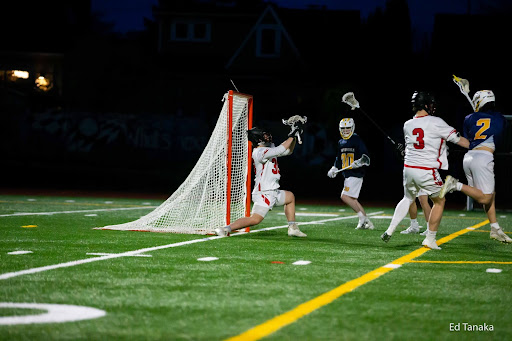 Goalie Cody Lavin making a save against West Seattle lacrosse. (Courtesy of Ed Tanaka)