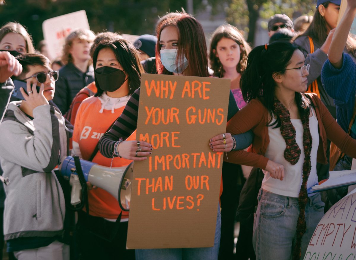 Executive Board member Noir Goldberg protesting at student-led rally at City Hall against gun violence in 2022. 