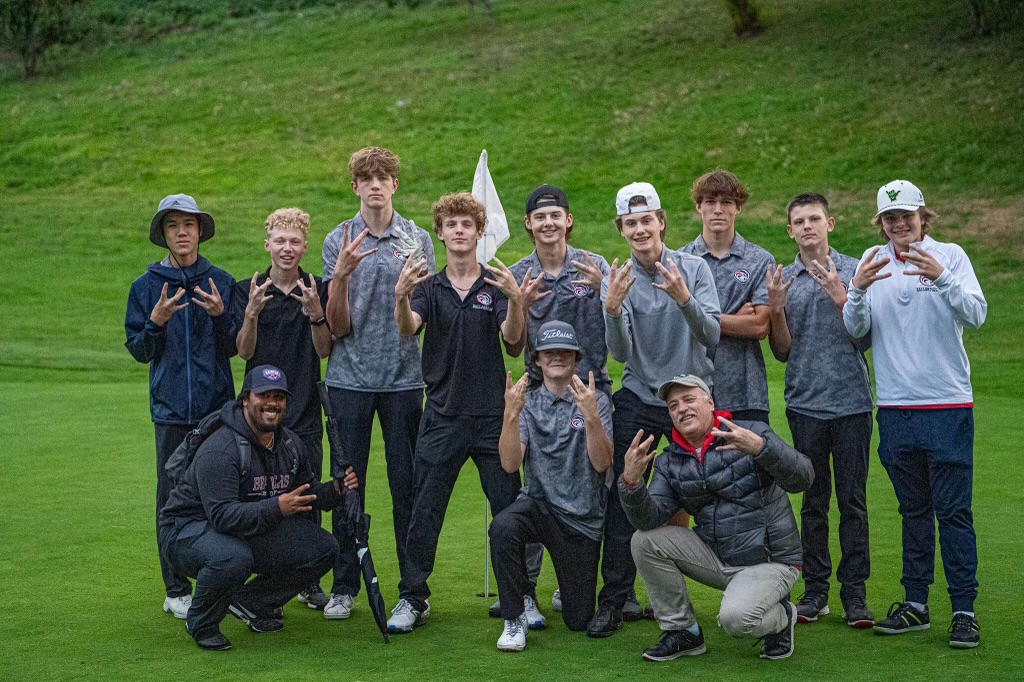 Ballard golf team posing together
after beating Seattle Prep, despite being lopsided underdogs. 