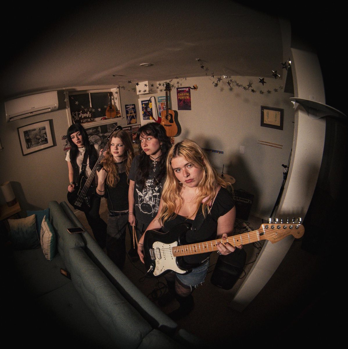 (from right to left) Miriam Goodman (12), Via Storms (12), Claire Nedderman (12), Mayumi Watanabe (12) The four band members are long time friends and met each other through the School of Rock.