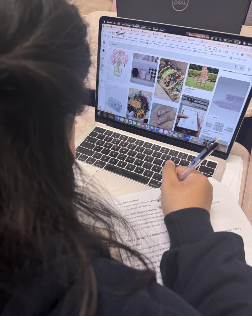MacBooks can also decrease student attentiveness, with media consumption at the fingertips of students appearing to be hard at work.